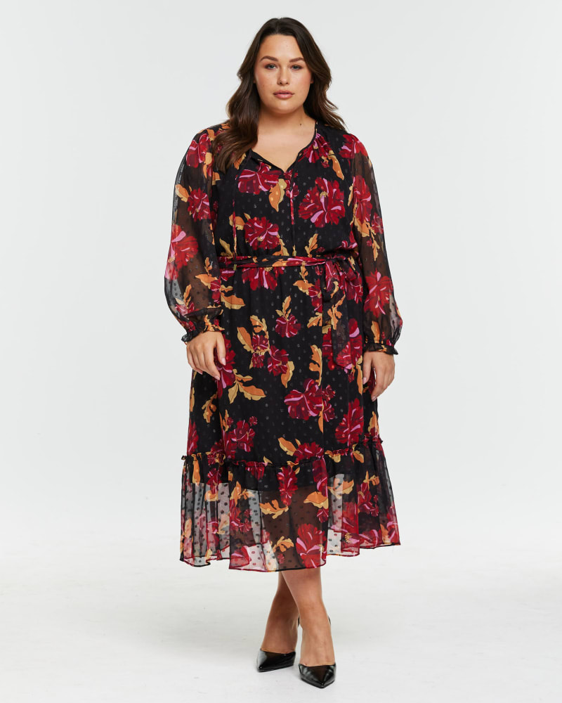 Front of a model wearing a size 20W Midnight Petal Dress in Print by Estelle. | dia_product_style_image_id:323882